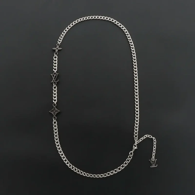 Silver and black letter and flower necklace