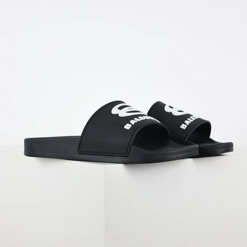 Balenciaga slippers in black and white