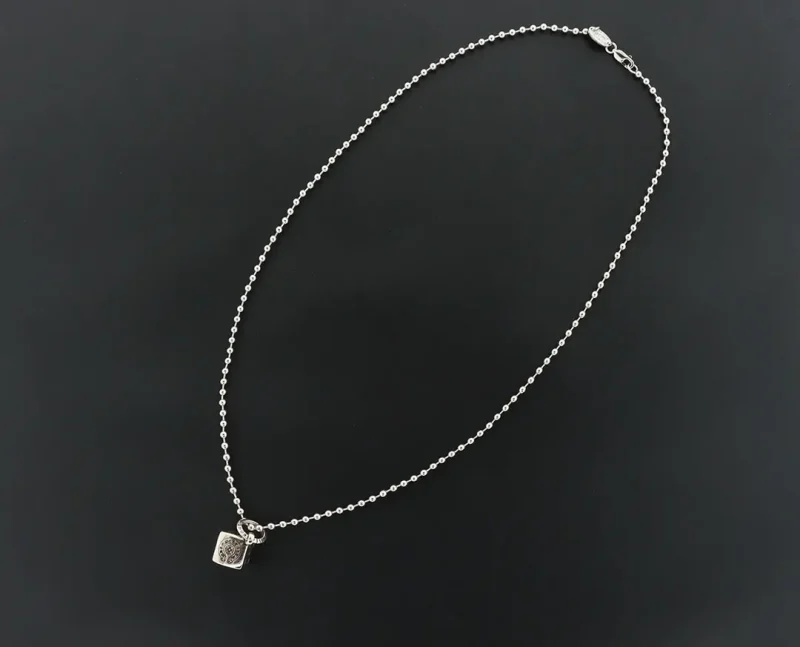 Multi-element dice pendant necklace