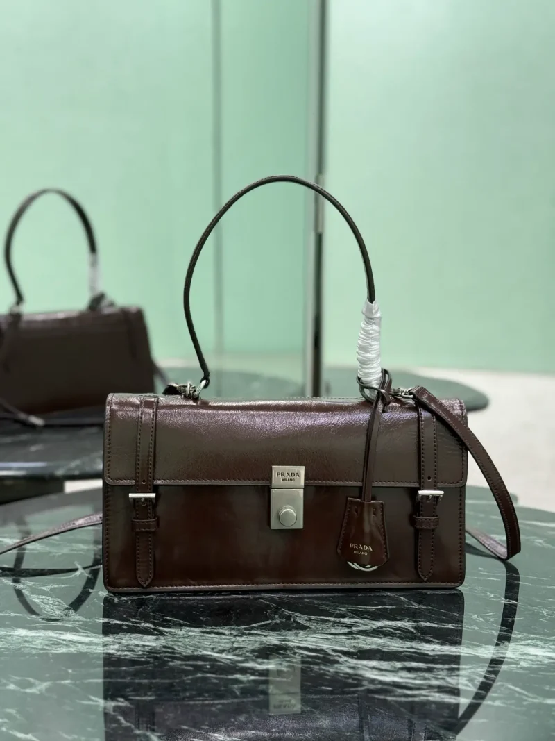 Briefcase length 32 high 16.5 x bottom 10cm