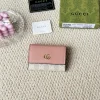 Gucci pink colorblock coin purse
