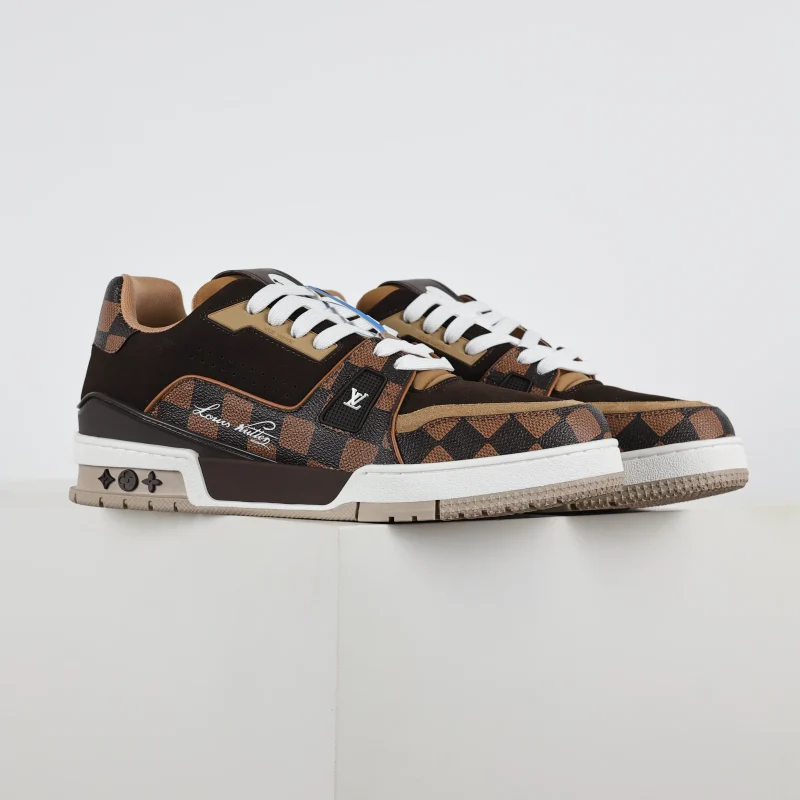 Trainer x Nigo low-top lace-up sneakers with round toe and brown checkerboard print