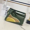 Cowhide Puzzle Edge Landscape Handbag in Aquarius Green Size: 24*10.5*16CM6