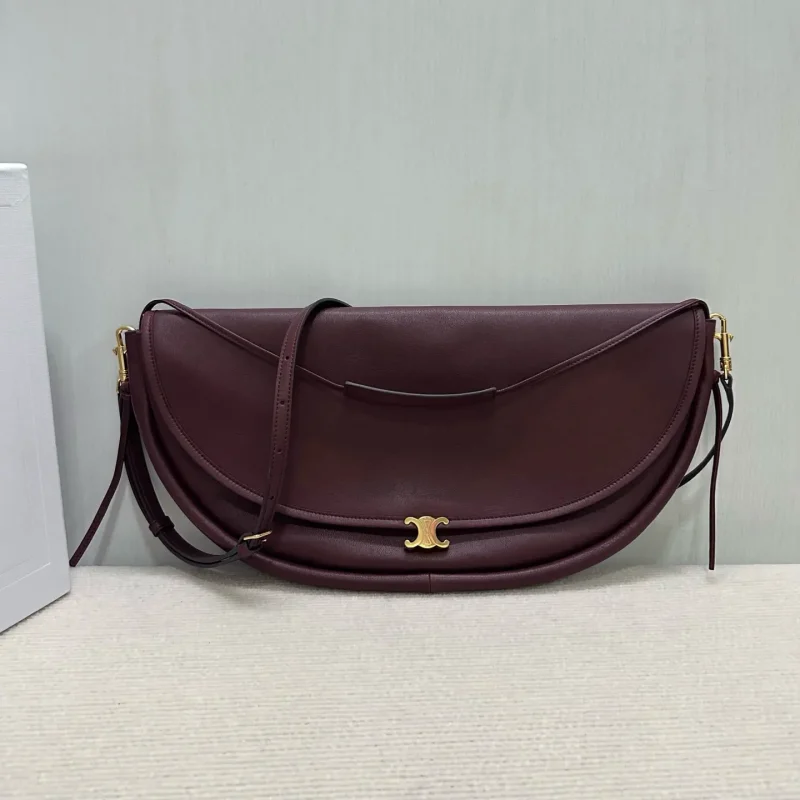 CE Halfmoon Bag — Burgundy | Dimensions: 46 x 19 x 10 cm6