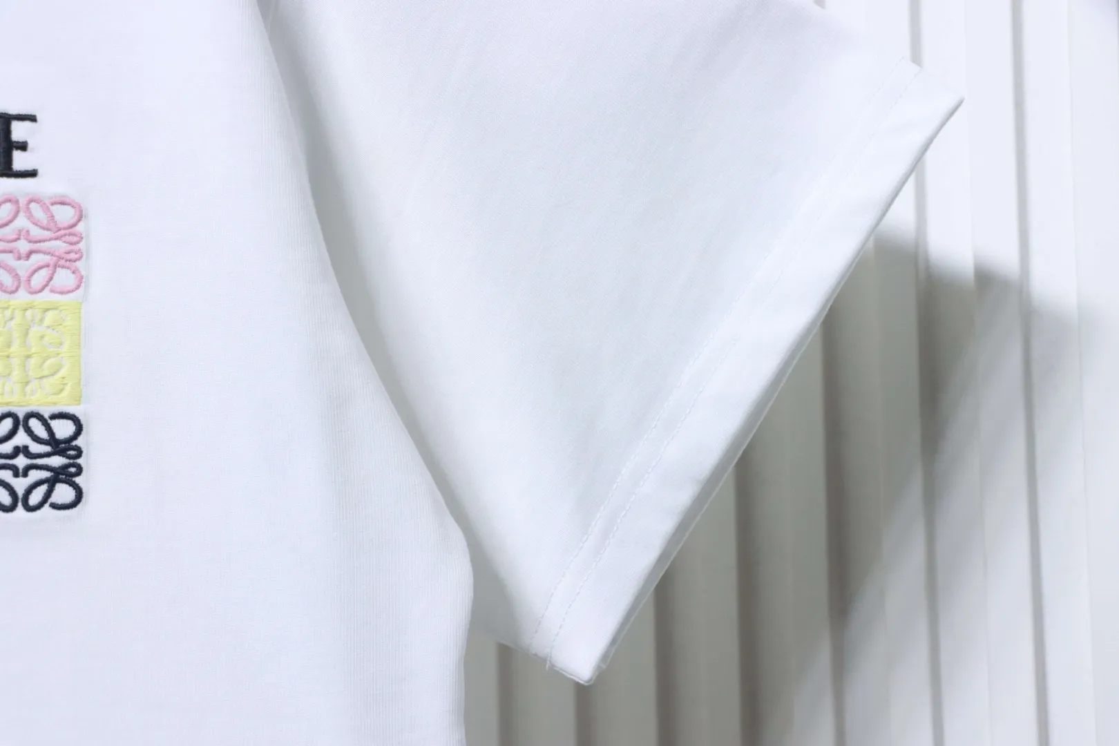 Grid Embroidered Logo Unisex T-Shirt - White - Left Sleeve