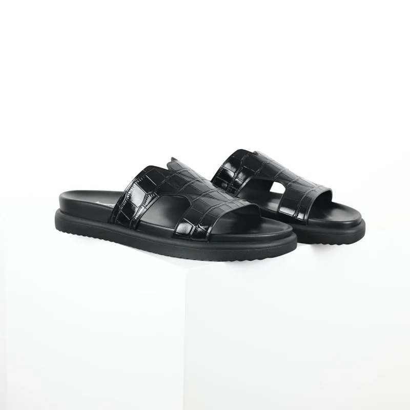 Oasis flat mules with a round toe, black crocodile leather