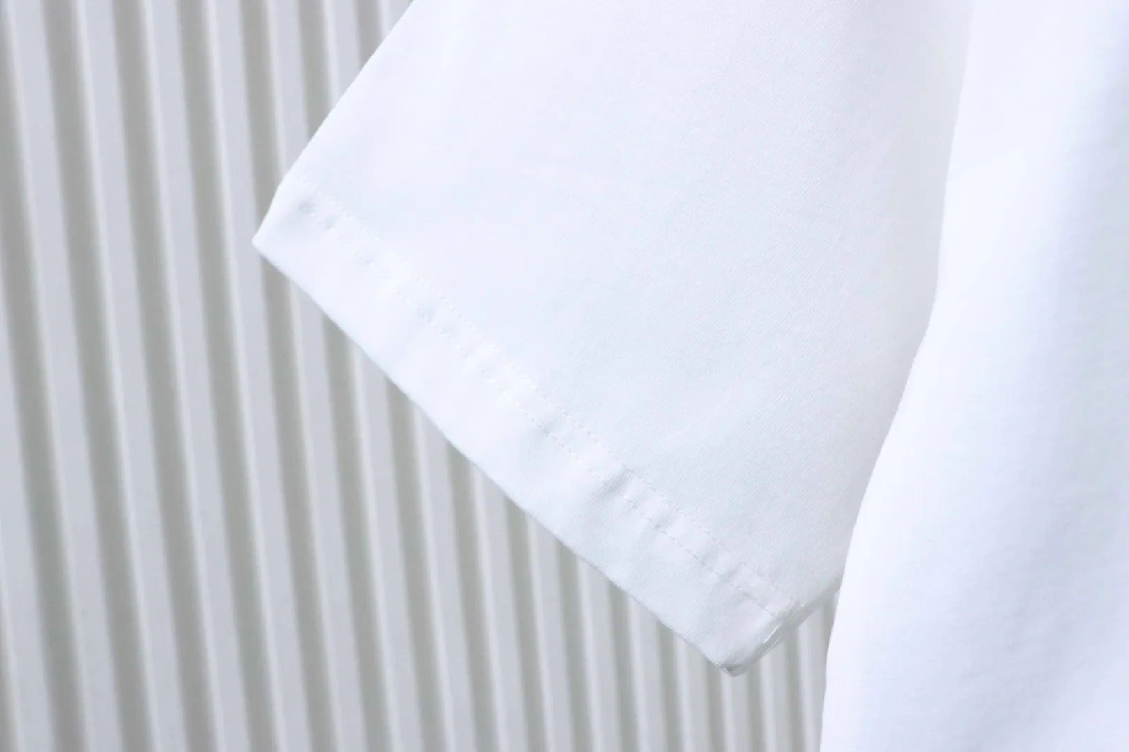 Tropical Animal Embroidered Cotton T-Shirt - Sleeve Left