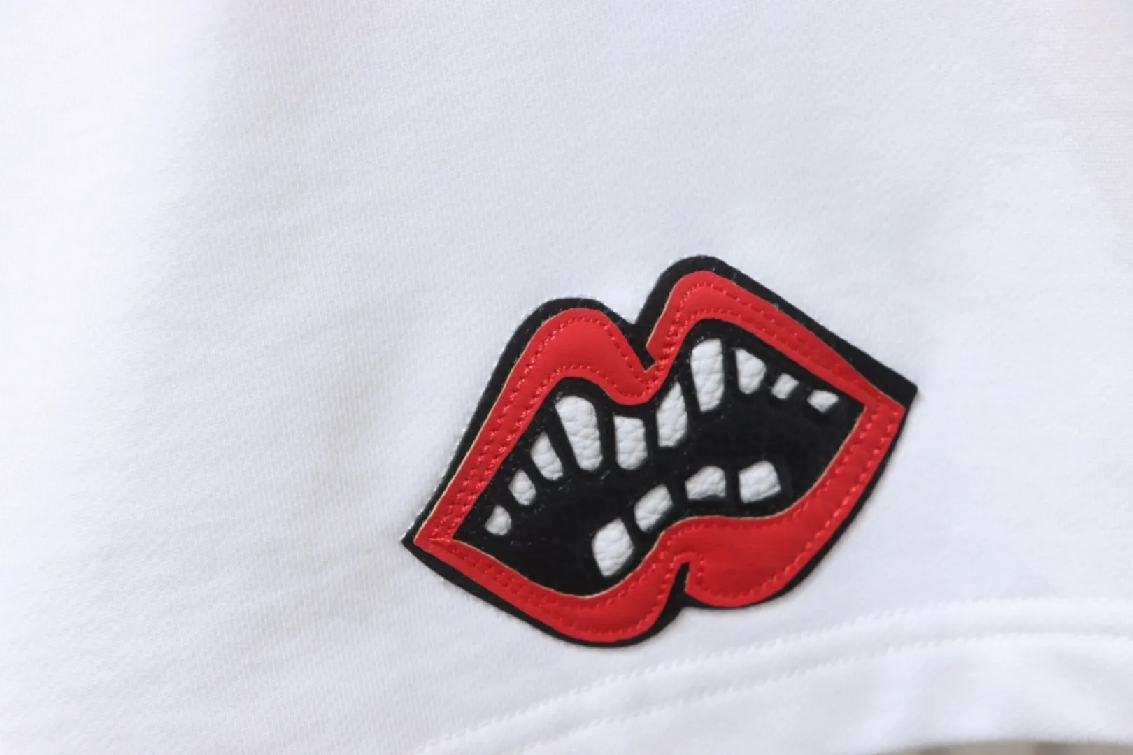 Red Mouth Embroidered Shorts - Mouth Details