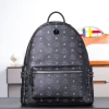 Black medium-sized studded backpack. Dimensions: 41*15.5*33.5cm