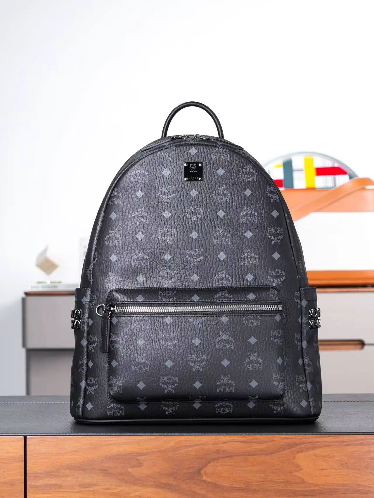 Black medium-sized studded backpack. Dimensions: 41*15.5*33.5cm3 Black medium-sized studded backpack. Dimensions: 41*15.5*33.5cm