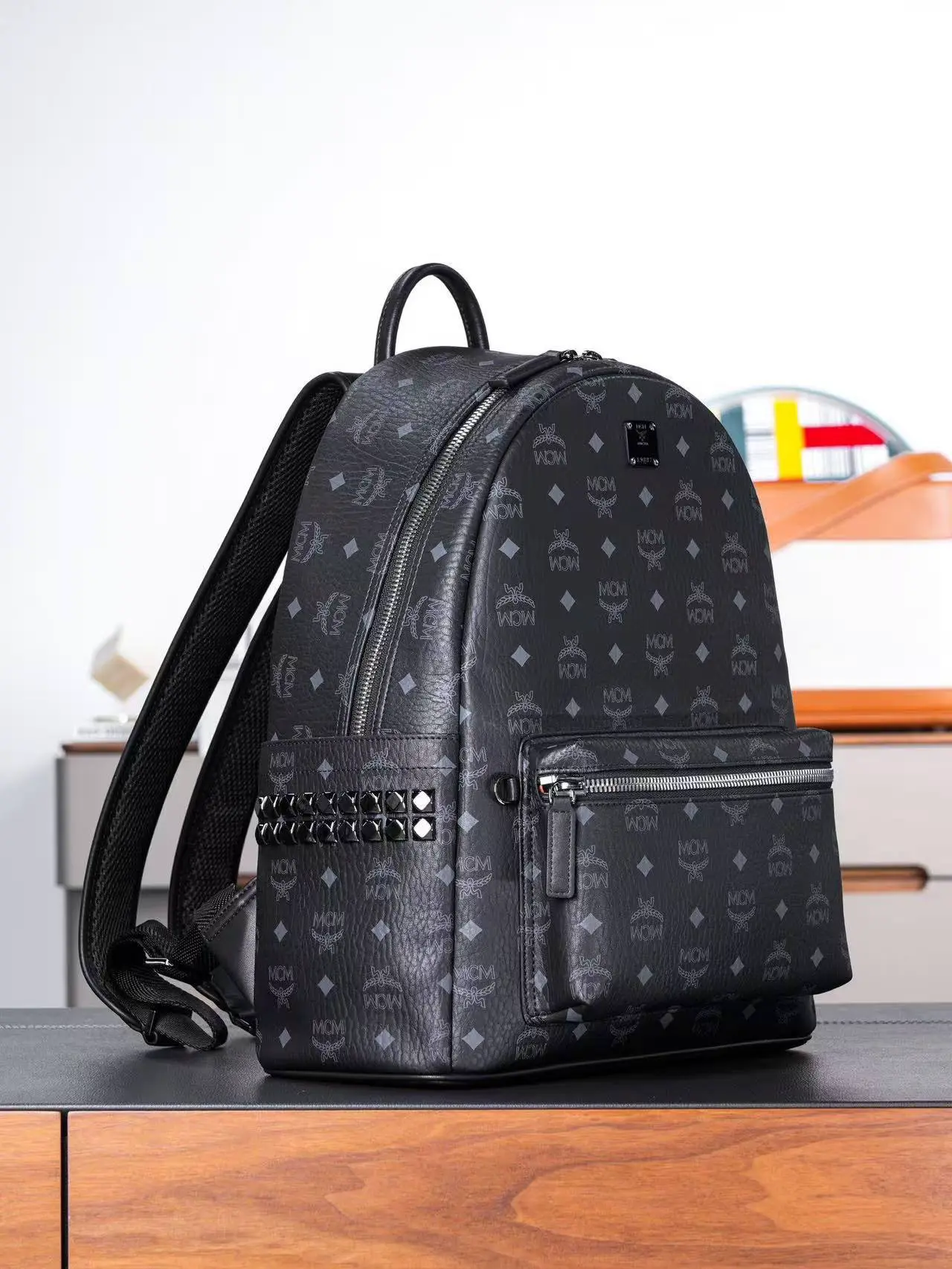 Black medium-sized studded backpack. Dimensions: 41*15.5*33.5cm4
