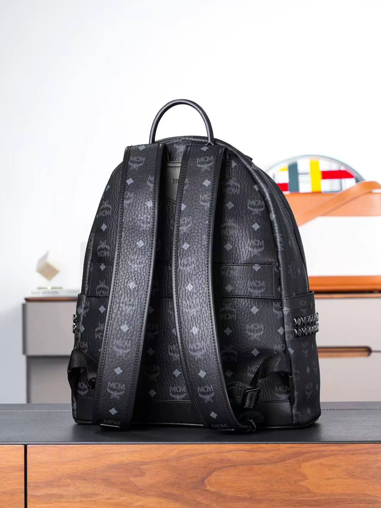Black medium-sized studded backpack. Dimensions: 41*15.5*33.5cm5