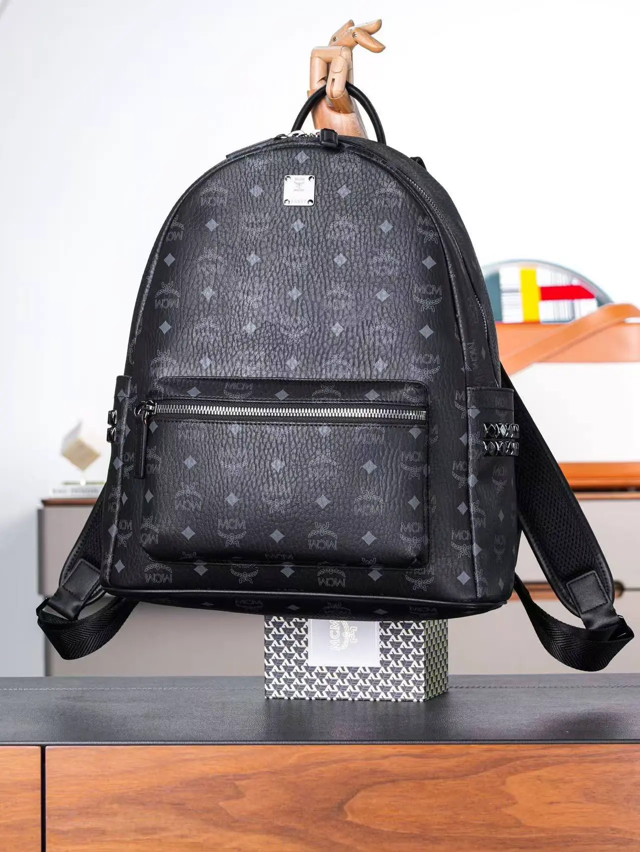 Black medium-sized studded backpack. Dimensions: 41*15.5*33.5cm7