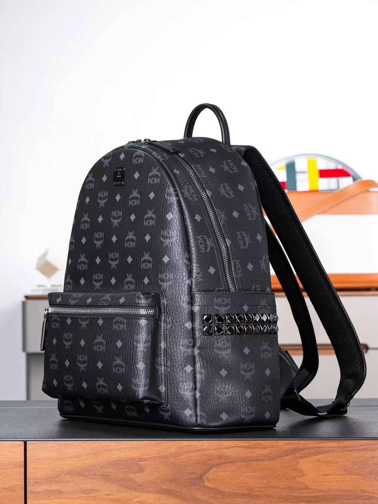 Black medium-sized studded backpack. Dimensions: 41*15.5*33.5cm8