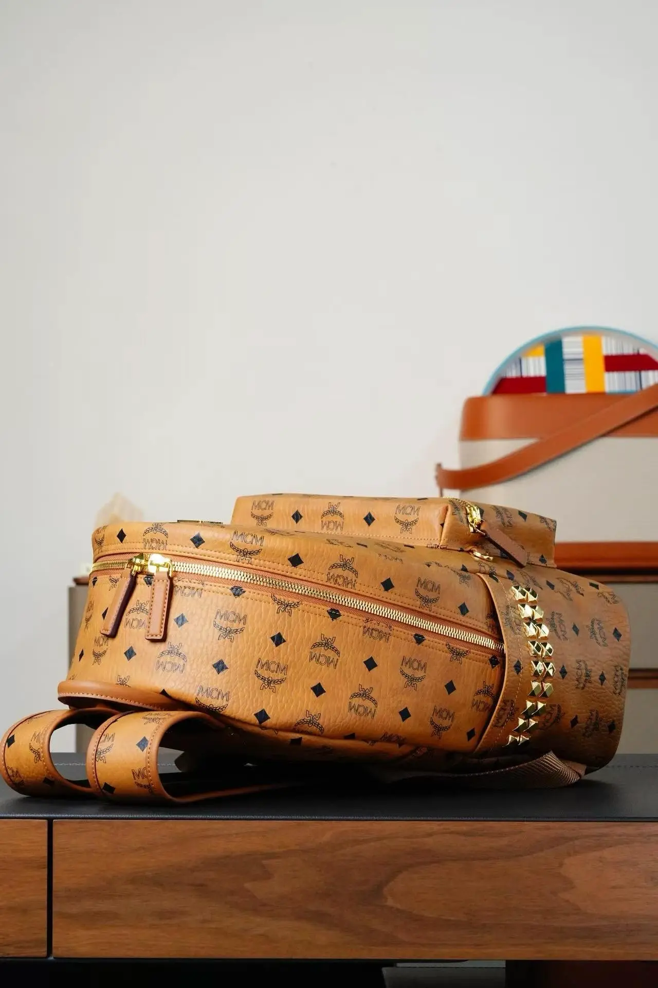 Brown medium-sized studded backpack. Dimensions: 41*15.5*33.5cm1