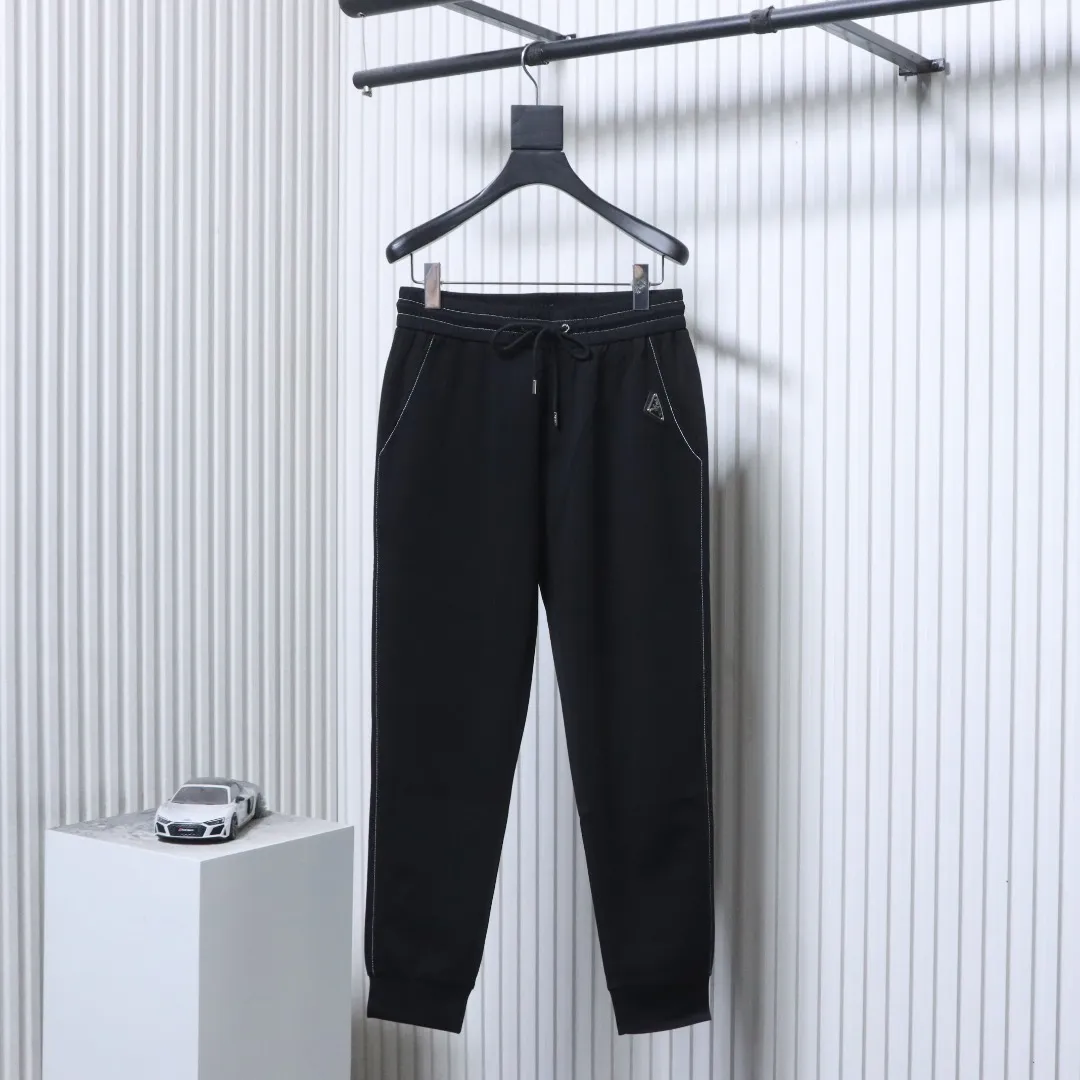 Casual Trousers with Triangle Logo Patch - Front View Black
