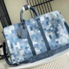 Handbag with color-blocked plaid pattern. Dimensions: 50x29x22CM