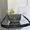 Médaillon flap bag in blue canvas. Dimensions: 23 x 16 x 6.5 cm (Length x Height x Width)