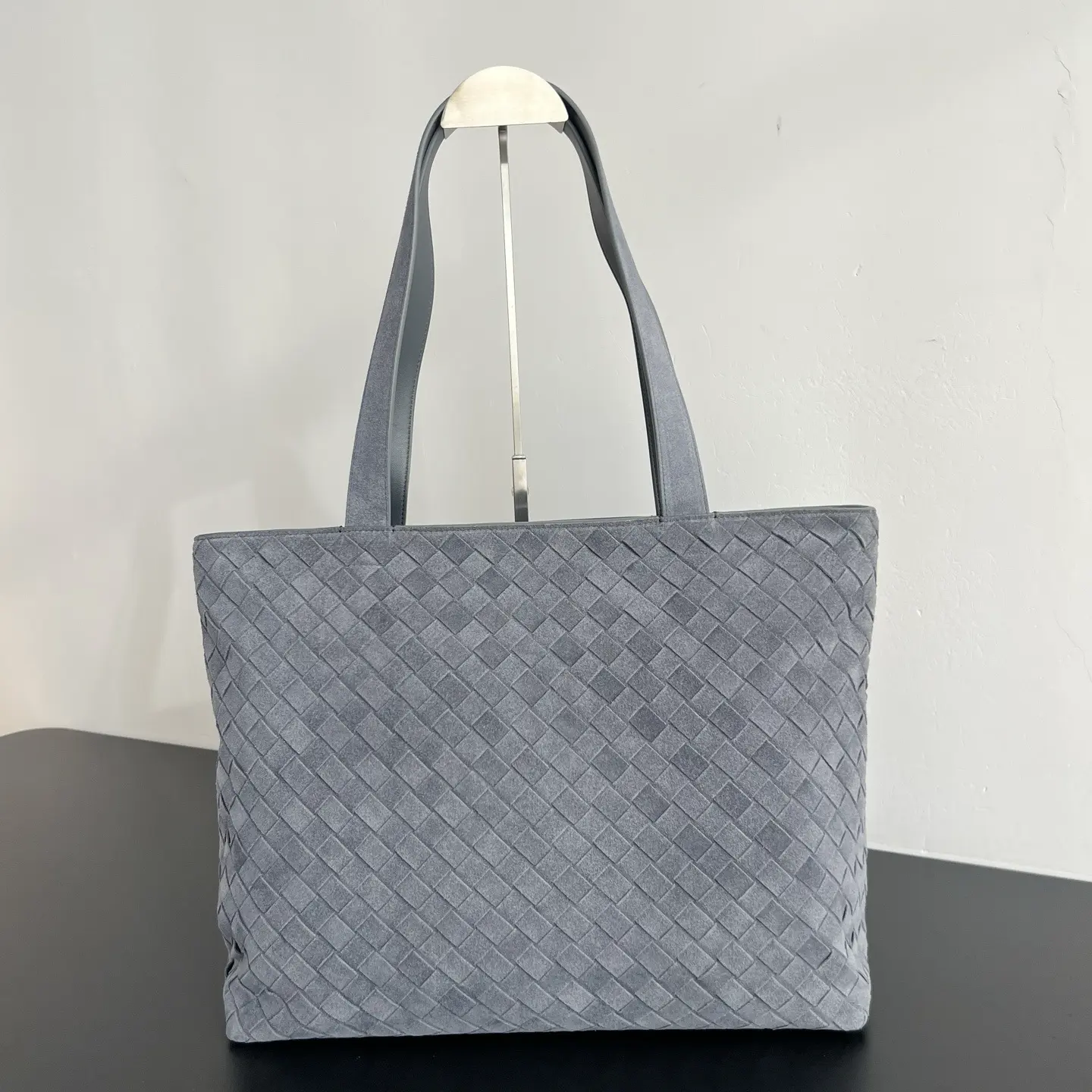 Bottega Veneta's new suede woven tote bag. Dimensions: Height 31cm * Width 43cm * Depth 15.5cm Bottega Veneta's new suede woven tote bag. Dimensions: Height 31cm * Width 43cm * Depth 15.5cm