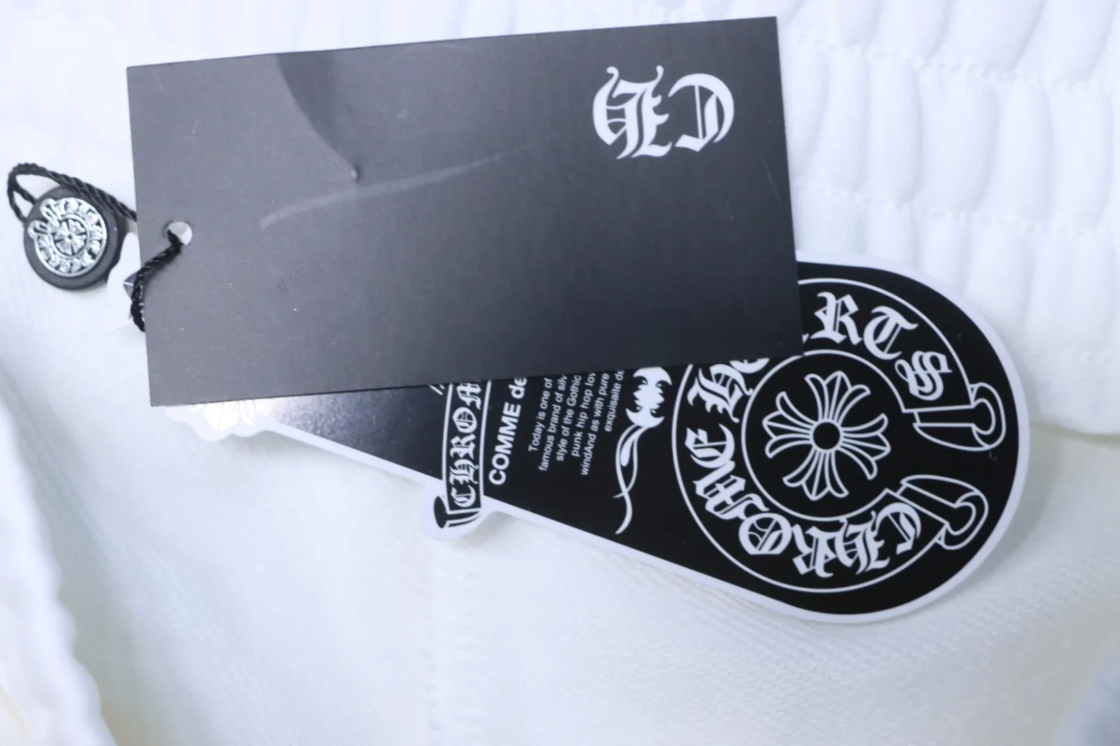 Cross Embroidery Logo Shorts - Hangtag