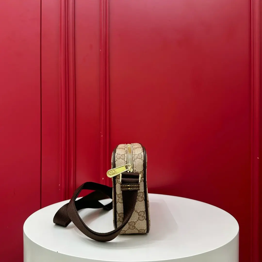 Kia mini handbag with woven ribbon, brown monogram. Dimensions: 21.5 x 14 x 5 cm6