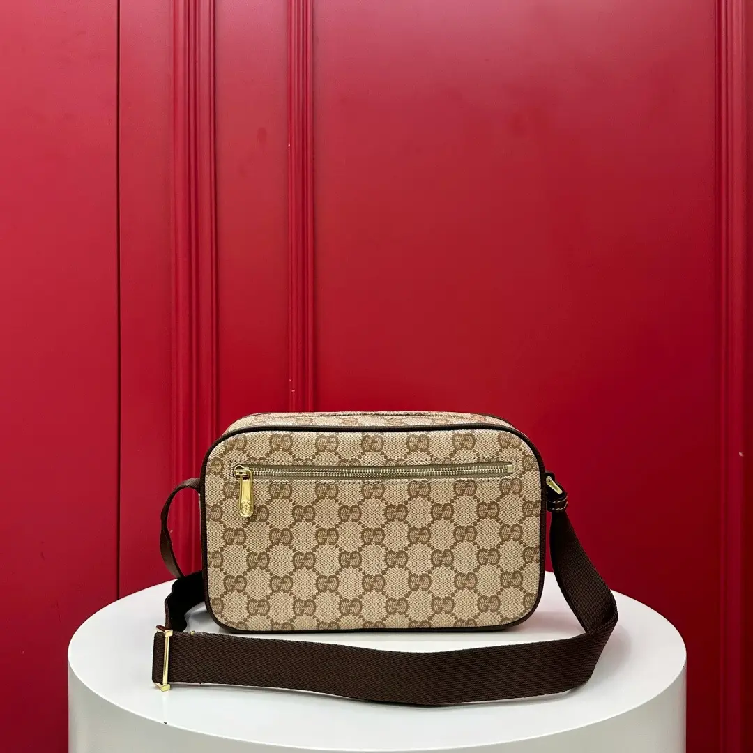 Kia mini handbag with woven ribbon, brown monogram. Dimensions: 21.5 x 14 x 5 cm7