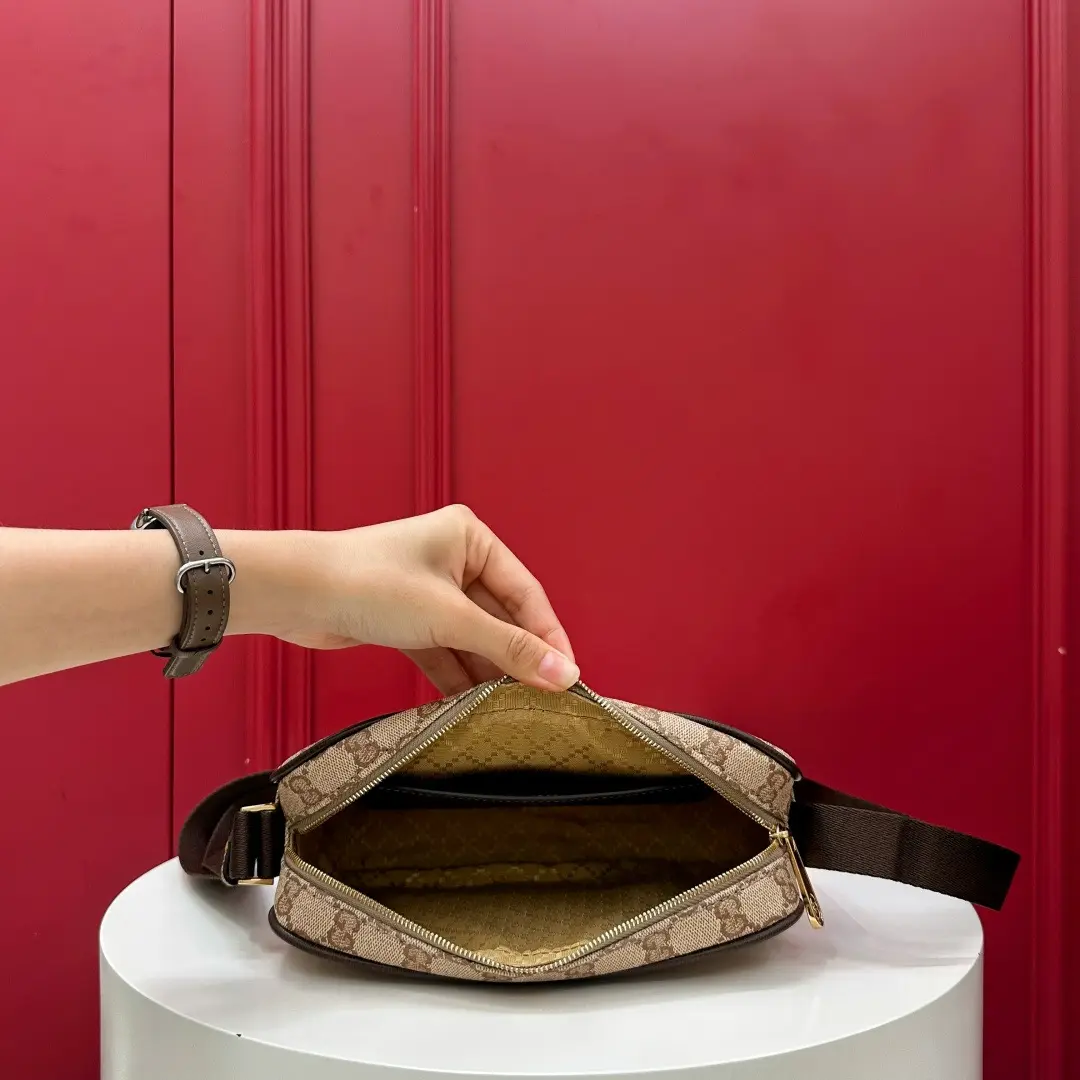 Kia mini handbag with woven ribbon, brown monogram. Dimensions: 21.5 x 14 x 5 cm8