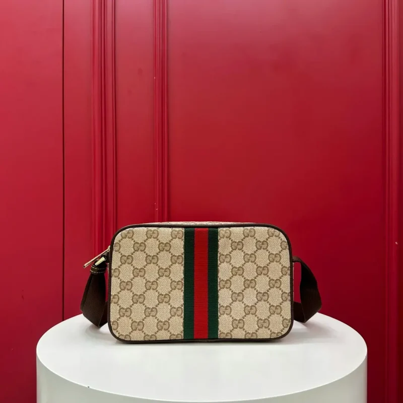 Kia mini handbag with woven ribbon, brown monogram. Dimensions: 21.5 x 14 x 5 cm