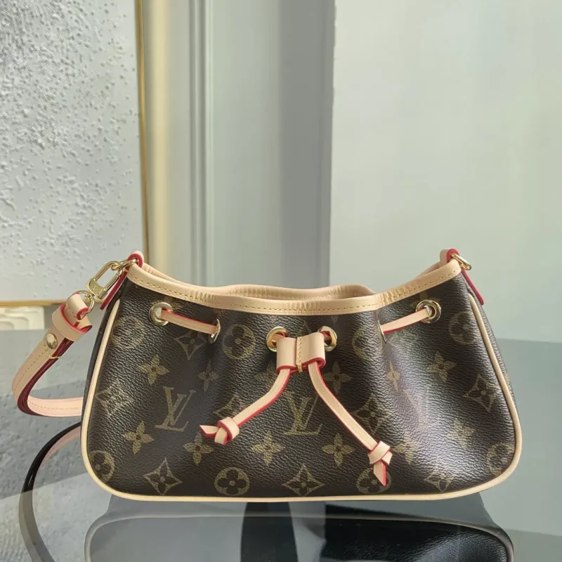 Nano Frivole Monogram canvas. Dimensions: 24 × 13 × 8 cm