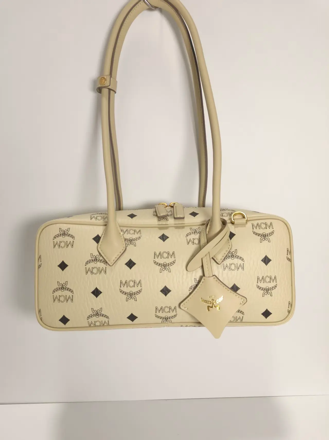 Off-white small sausage bag dimensions: 27*12cm2